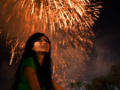 woman watching fireworks